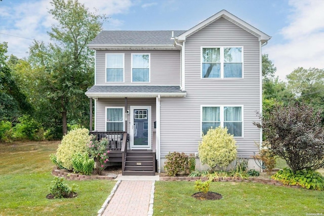 view of front facade featuring a front yard