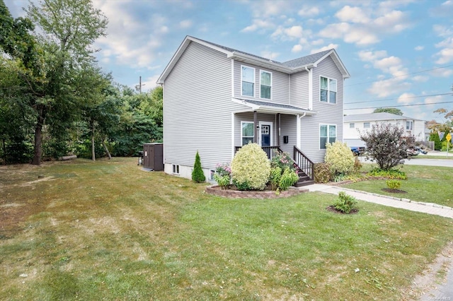 view of front of home with a front lawn