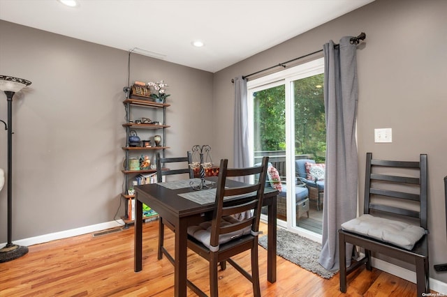 dining area featuring light wood-type flooring