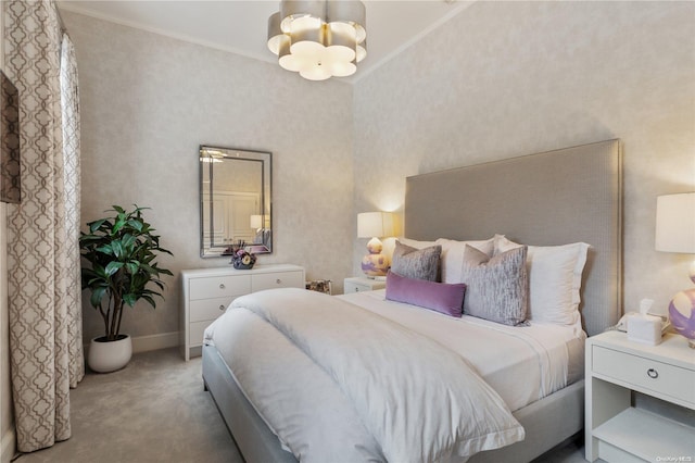 bedroom with light carpet, an inviting chandelier, and crown molding