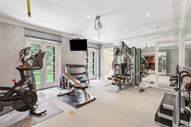 gym with french doors, carpet floors, and ornamental molding