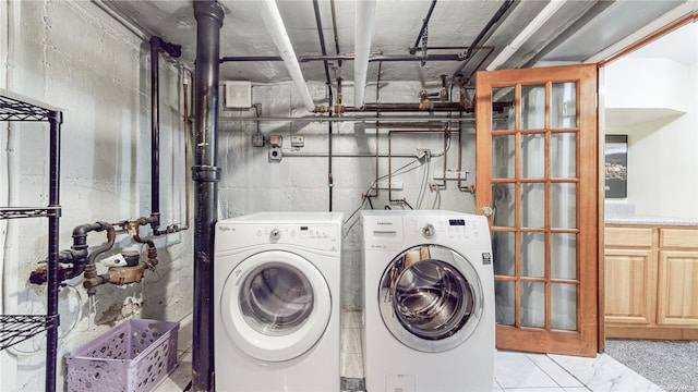 laundry area featuring washer and clothes dryer