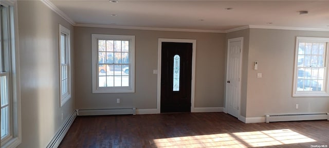 entrance foyer featuring crown molding, dark wood-type flooring, and a baseboard heating unit