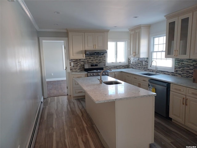 kitchen with dark hardwood / wood-style flooring, dishwasher, a center island with sink, and sink