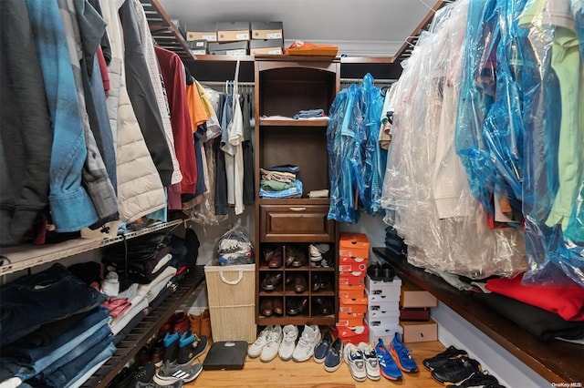 walk in closet featuring wood-type flooring