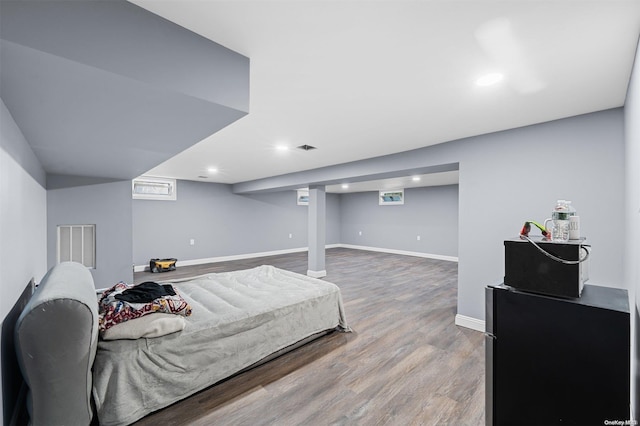 bedroom featuring hardwood / wood-style flooring