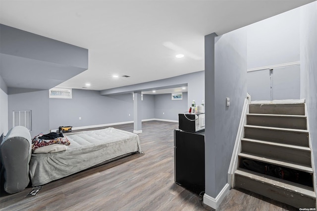 bedroom featuring hardwood / wood-style flooring