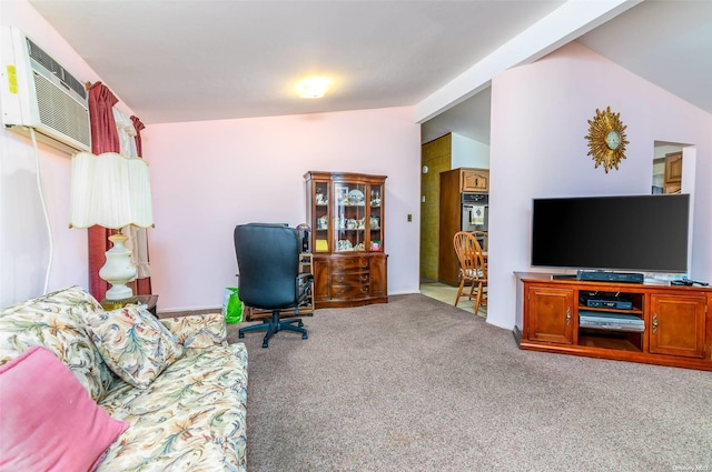 office space featuring a wall mounted AC, carpet floors, and vaulted ceiling