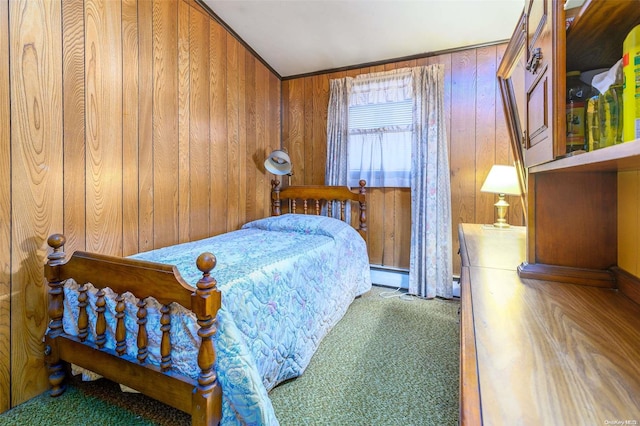 carpeted bedroom featuring wood walls and baseboard heating