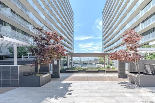 131-05 40th Rd Unit 10J, Flushing, NY 11354 - view of home's community with a wooden deck