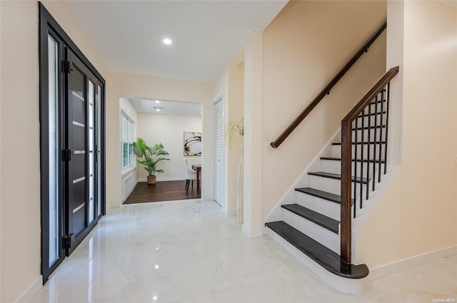 410 Church Ave, Woodmere, NY 11598 - entrance foyer featuring stairs, marble finish flooring, and recessed lighting