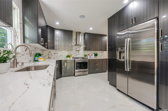 410 Church Ave, Woodmere, NY 11598 - kitchen featuring appliances with stainless steel finishes, wall chimney exhaust hood, decorative backsplash, modern cabinets, and recessed lighting