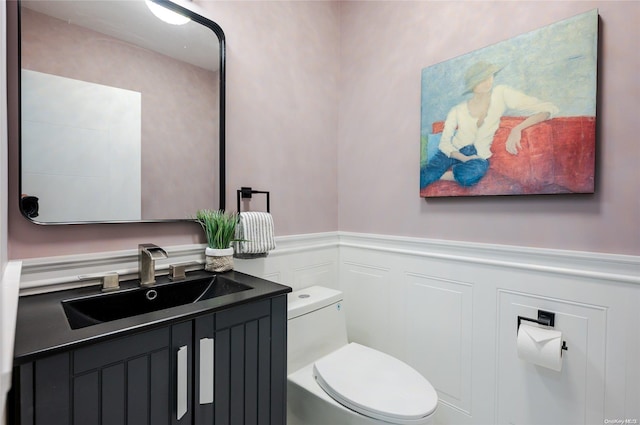 410 Church Ave, Woodmere, NY 11598 - half bath with vanity, a wainscoted wall, and a decorative wall