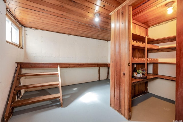 basement featuring wood ceiling