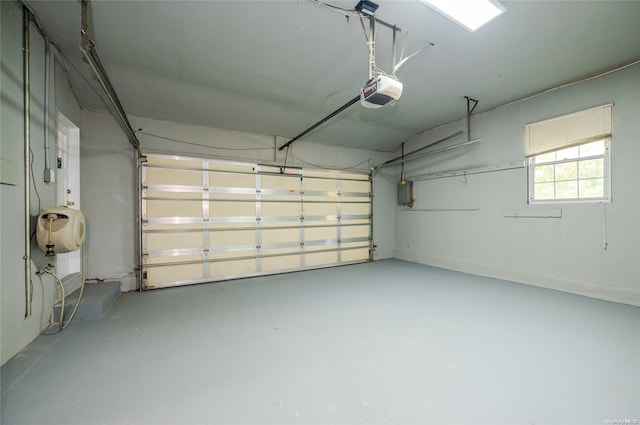 garage featuring a garage door opener