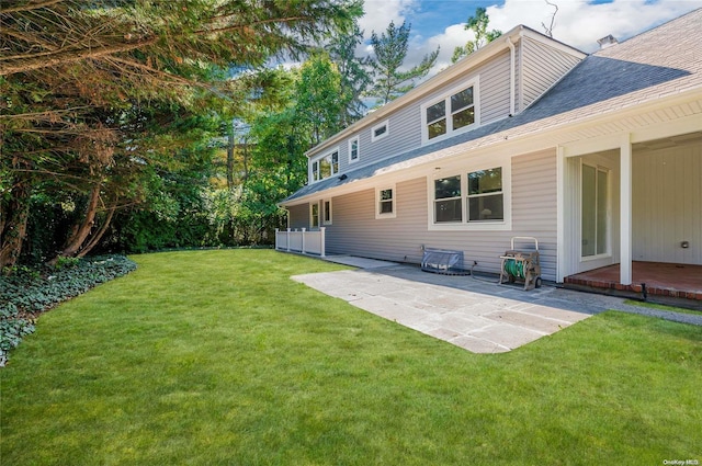 410 Church Ave, Woodmere, NY 11598 - view of grassy yard featuring a patio area