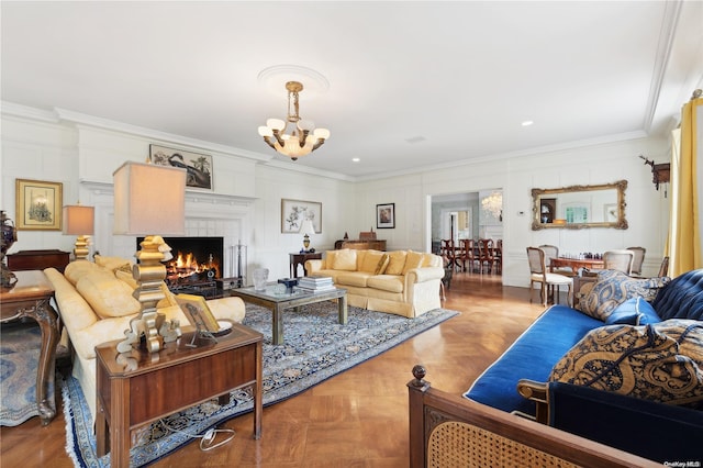 living room with parquet flooring, a fireplace, a notable chandelier, and ornamental molding