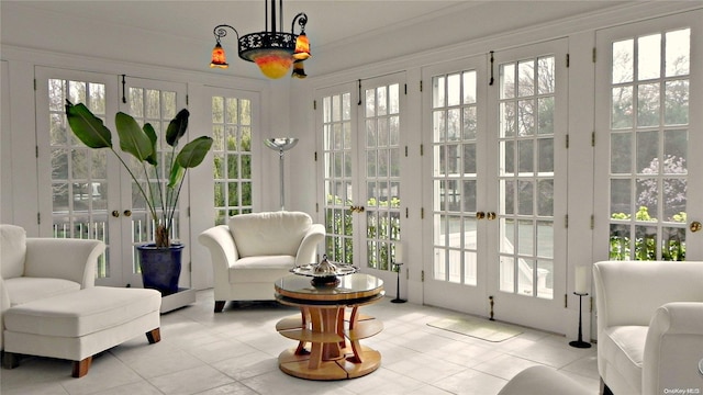 sunroom featuring a wealth of natural light and french doors