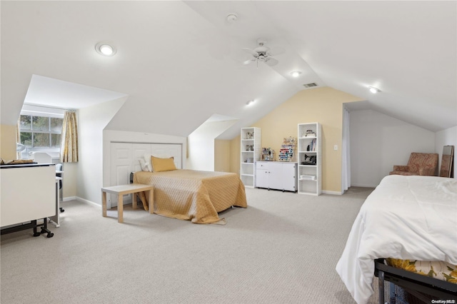 bedroom with light carpet, vaulted ceiling, and ceiling fan