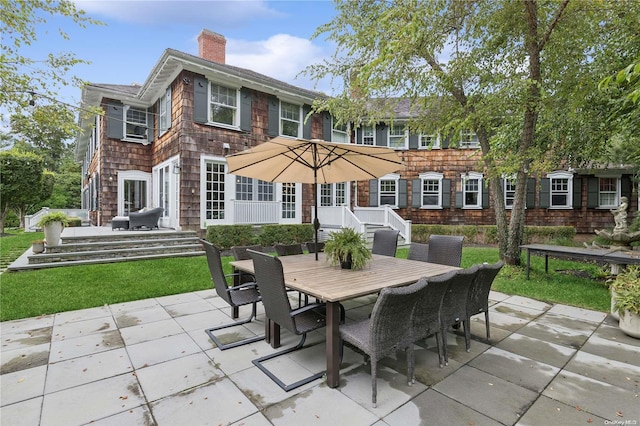 rear view of property with a patio