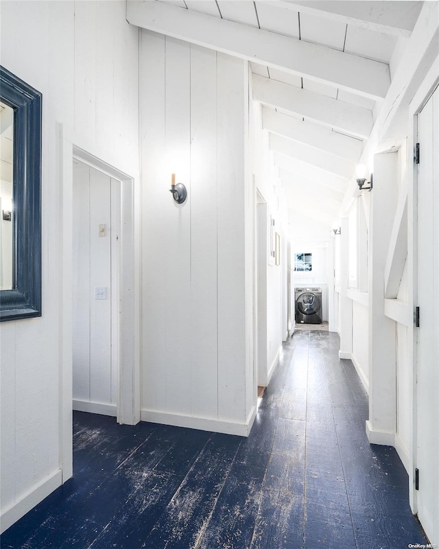 corridor featuring vaulted ceiling with beams and washer / clothes dryer