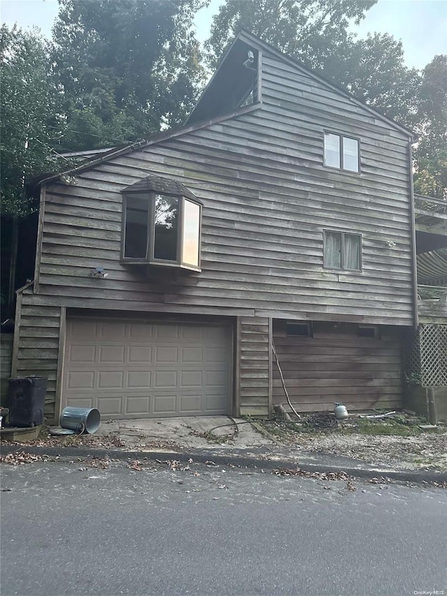 view of home's exterior featuring a garage