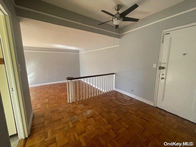 interior space featuring dark parquet floors