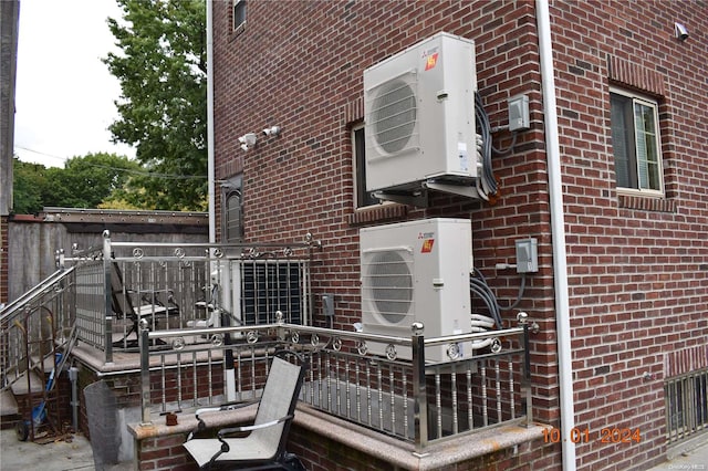 wooden terrace with ac unit