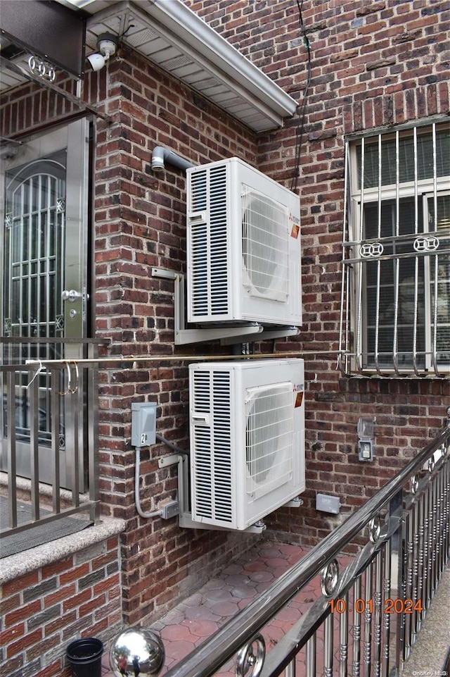 doorway to property with ac unit