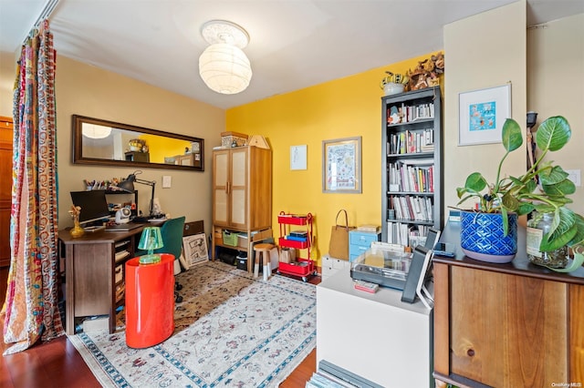 office area with hardwood / wood-style floors