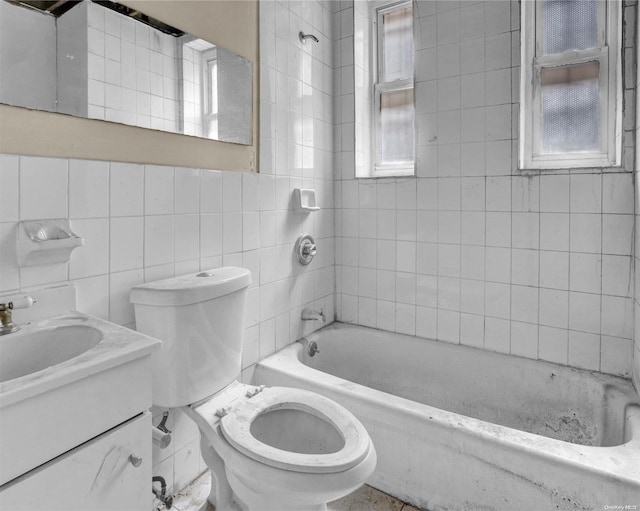 475 W 140th St, New York Manhattan, NY 10031 - full bathroom featuring tile walls, toilet, vanity, and shower / bathtub combination