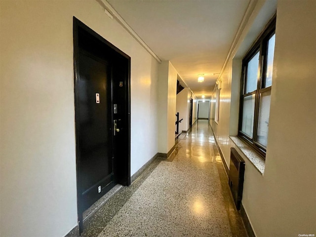 37-27 86th St Unit 4A, Jackson Heights, NY 11372 - hall with speckled floor and radiator