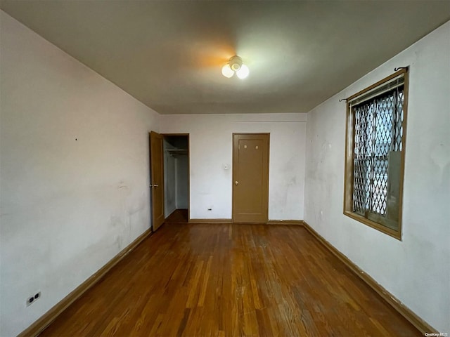 37-27 86th St Unit 4A, Jackson Heights, NY 11372 - empty room with wood finished floors and baseboards