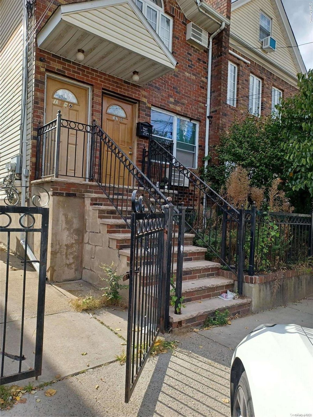 doorway to property with cooling unit