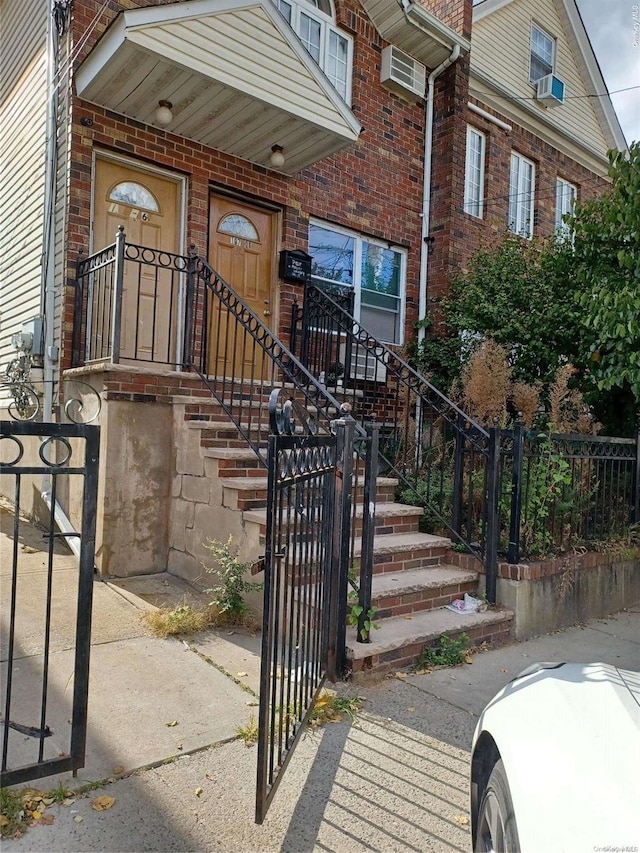 doorway to property with cooling unit