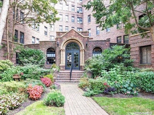 property entrance featuring french doors