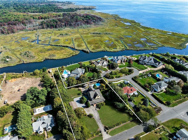 75 Oak Neck Ln, West Islip, NY 11795 - aerial overview of property's location with a large body of water, property parcel outlined, and nearby suburban area