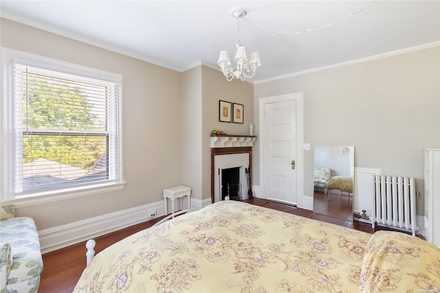 75 Oak Neck Ln, West Islip, NY 11795 - bedroom with radiator, a chandelier, dark wood-style flooring, ornamental molding, and baseboards