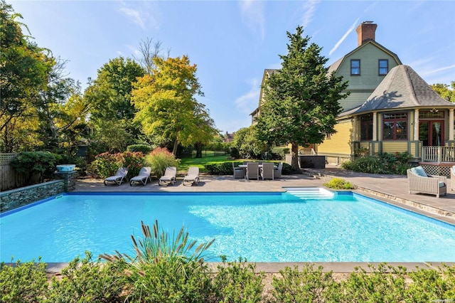 75 Oak Neck Ln, West Islip, NY 11795 - outdoor pool featuring a patio area