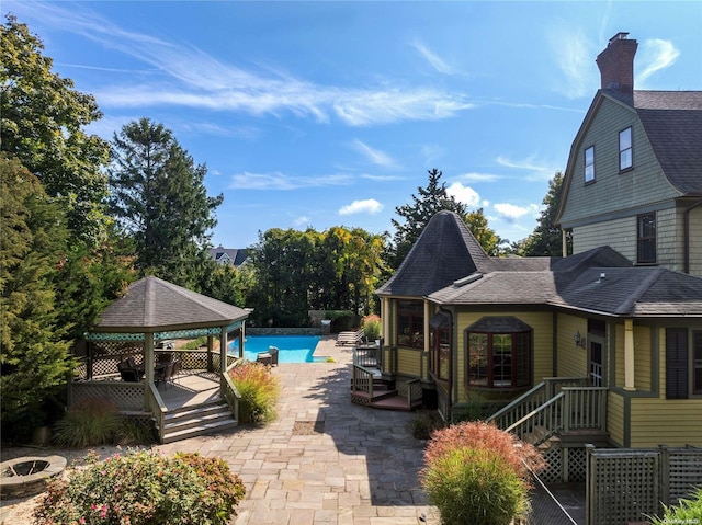 75 Oak Neck Ln, West Islip, NY 11795 - view of swimming pool featuring a gazebo, a deck, and a patio