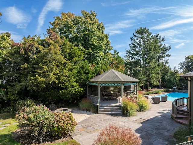 75 Oak Neck Ln, West Islip, NY 11795 - view of patio / terrace with a gazebo, an outdoor pool, and a deck