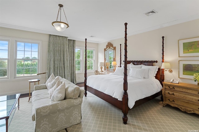 bedroom with crown molding