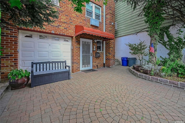 view of patio / terrace featuring a garage