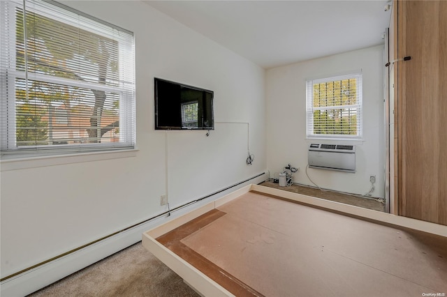 interior space with carpet and baseboard heating