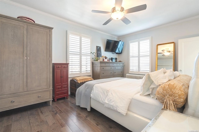 bedroom with multiple windows, ceiling fan, dark wood-type flooring, and ornamental molding