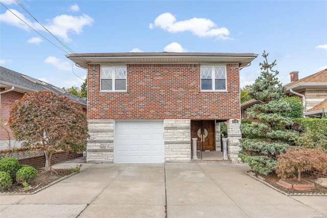 front of property with a garage