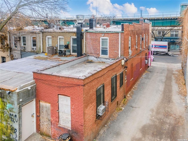 exterior space featuring central AC unit