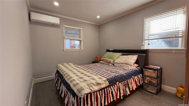 bedroom featuring baseboards, a baseboard radiator, wood finished floors, crown molding, and an AC wall unit