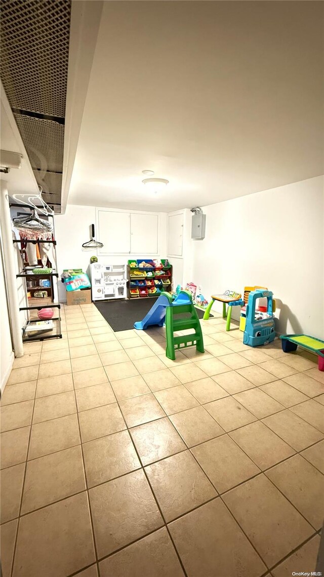 playroom with tile patterned flooring