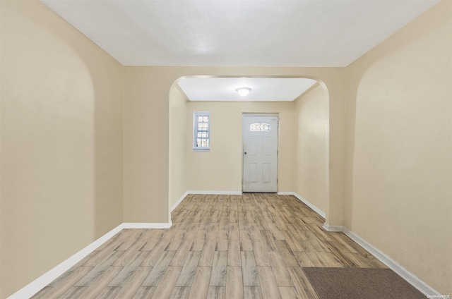 entrance foyer with light wood-type flooring